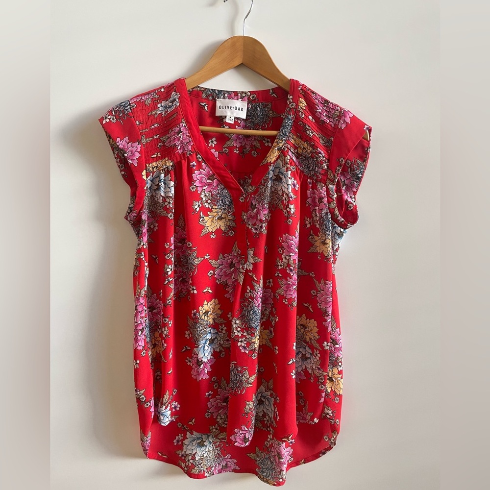 Red floral blouse